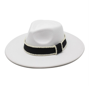 Elegant French wool felt fedora in beige with pearl-studded black ribbon detail
