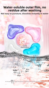 Close-up of 5D laundry pods dissolving in water showing fast-dissolving water-soluble film
