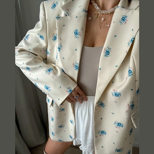 Women's floral print blazer in cream with blue accents and relaxed oversize fit