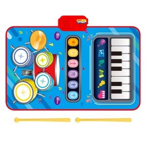 Blue 2-in-1 children's musical play mat with piano, jazz drum, and yellow drumsticks