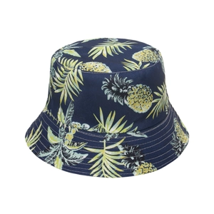 Close-up of navy bucket hat with yellow pineapple prints and reinforced stitched brim