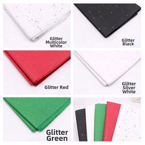 Close-up of glitter tissue paper available in five colors for Christmas gift wrapping