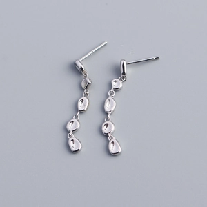 Detailed view of silver S925 sterling silver tassel earrings with irregular oval shapes