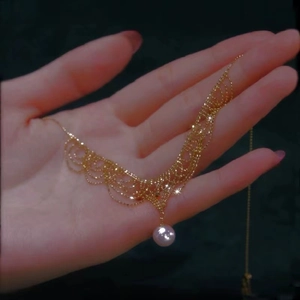 Elegant 24K gold plated lace choker with multi-layer metal beads and a white pearl pendant