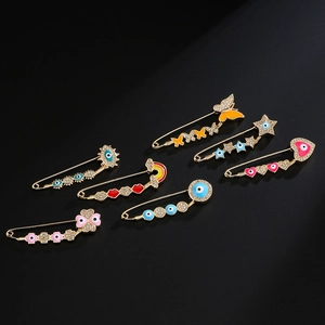 Colorful 18K gold-plated enamel safety pins featuring butterfly heart and evil eye charms