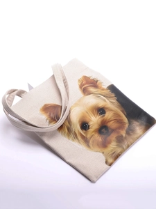 Detailed close-up of Yorkshire Terrier print on a minimalist beige canvas tote bag