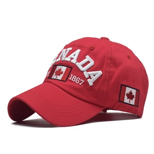 Detail of red Canada baseball cap featuring 1867 3D embroidery and maple leaf logo