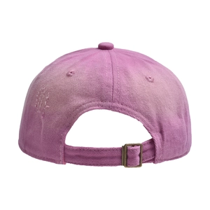 Macro shot of rose purple distressed baseball cap with adjustable bronze metal buckle back
