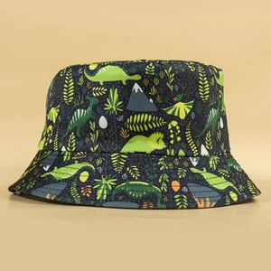 Reversible bucket hat with cartoon dinosaur print on navy canvas for sun protection
