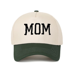 Detail of MOM letter embroidery on a retro contrast color baseball trucker hat