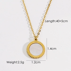 Macro shot showing round white shell pendant size details and polished gold chain