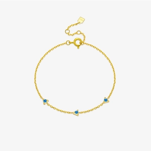 Elegant S925 sterling silver gold-plated bracelet with three triangle blue gemstones