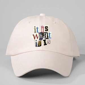 Pink adjustable cotton baseball cap with 'it is what it is' printed text on front