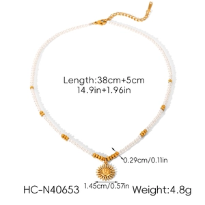 Detail view of pearl chain necklace with golden sunflower pendant and precise measurements
