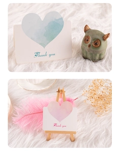 Detail of heart-shaped cutout Thank You cards with watercolor dye and mini easel