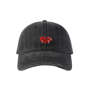 Distressed washed charcoal baseball cap with red embroidered heart and torn brim detail