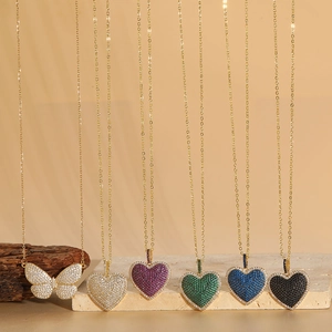 Elegant heart and butterfly pendant necklaces with vibrant zircon stones in gold plating