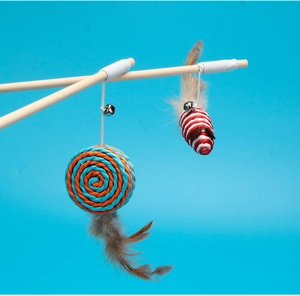 Detail of wooden cat wands with colorful woven balls, natural feathers and bells
