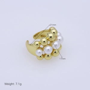 Detail showing ring dimensions 21mm and 17mm with pearls and golden beads