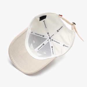 Interior detail view of a breathable mesh baseball cap with adjustable back strap