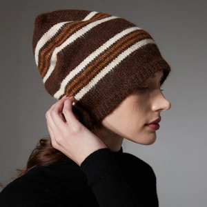 Brown striped wool knit beanie hat for men and women shown on a model side view