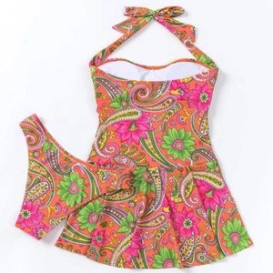 Two-piece halter tankini swimsuit with orange floral paisley print and skirted bottom
