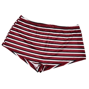 Detailed flat lay of red black and white striped shorts with elastic waistband