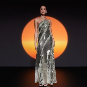 Silver sequin halter neck evening dress for women with a long floor-length design