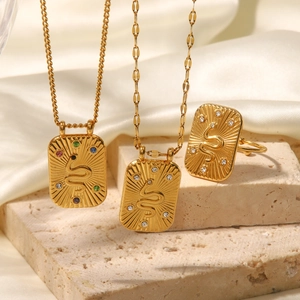 Retro gold stainless steel snake pendant necklaces and gemstone ring set on silk