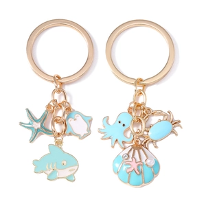 Cute gold ocean animal keychains with whale shark shell and pearl charms for women