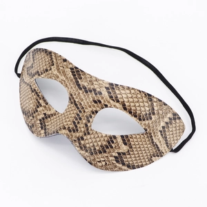 Detailed view of the brown snakeskin print masquerade eye mask with realistic texture