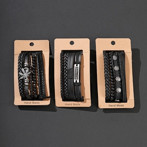 Men's 4-piece black leather beaded bracelet set featuring leaf pendant and star charms