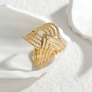 Polished 18K gold wide layered chevron ring with beaded texture and geometric hollow design