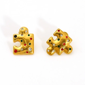 Polished puzzle piece stud earrings with colorful cubic zirconia in gold-plated steel