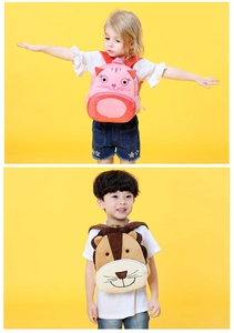 Detail of plush cartoon animal backpacks for kids featuring soft pink cat and brown lion