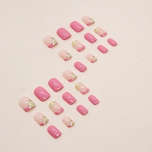 Short square press-on nails set featuring pink French tips and lemon slice pattern