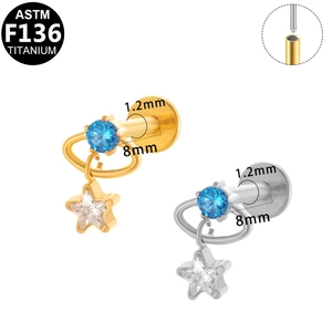 Titanium star stud earrings and labret with blue center stone in gold and silver finish