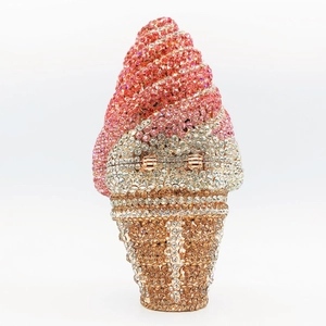 Detailed macro of crystal-encrusted ice cream cone clutch with sparkling pink rhinestones
