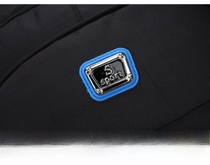 Detail of the black oxford fabric backpack featuring a blue-rimmed S Sport metal logo