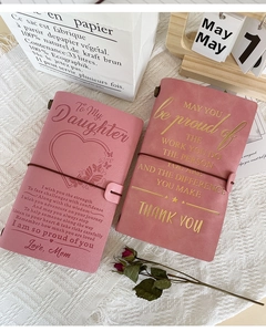 Pink leather journals for daughters with embossed motivational text and gift packaging