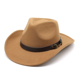 Close-up of camel wool felt cowboy hat with brown leather band and bronze metal buckle