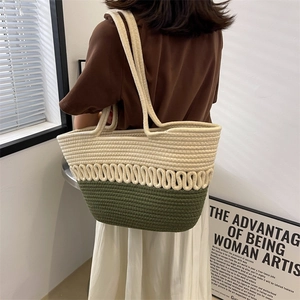 Large woven tote bag with ivory and dark green stitching for summer beach vacations