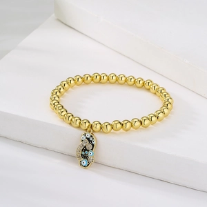 18K gold-plated beaded bracelet featuring a turquoise enamel Evil Eye charm with zircons