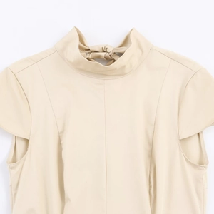 Chic beige high-neck midi dress with stylish side cutout and elegant back neck tie detail