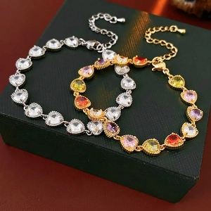 Elegant heart-shaped zircon bracelets in gold and silver finish with colorful gemstones
