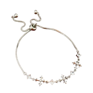 Silver adjustable cross bracelet with round clear zirconia stones on white background