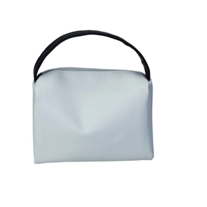 Minimalist white PU leather handbag with black curved handle and top zipper closure
