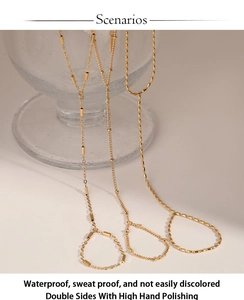 Detail of PVD gold plated stainless steel bead chains showing waterproof and sweatproof quality