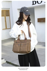 Braune Umhängetasche aus Canvas mit Reißverschlusstaschen im Streetstyle-Look