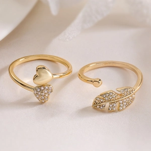 Elegantly designed 18K gold plated open rings featuring zircon hearts and leaf patterns
